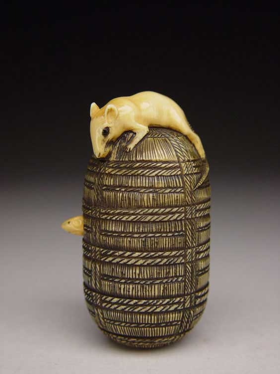 Appraisal: ANTIQUE IVORY NETSUKE Well carved and detailed antique ivory netsuke