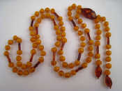 Appraisal: An amber bead sautoir necklace length cm