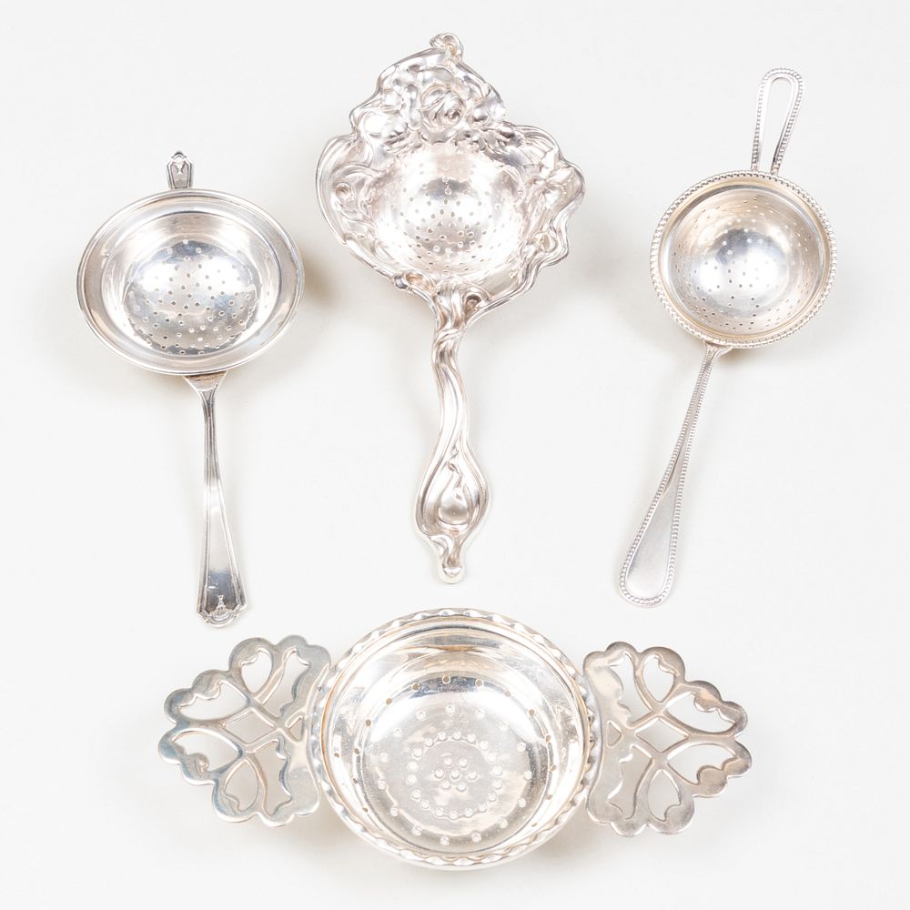 Appraisal: Group of Silver Teawares Comprising A German strainer with beaded