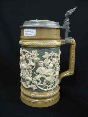 Appraisal: Mettlach Pottery Stein festive party scene in relief inlaid lid