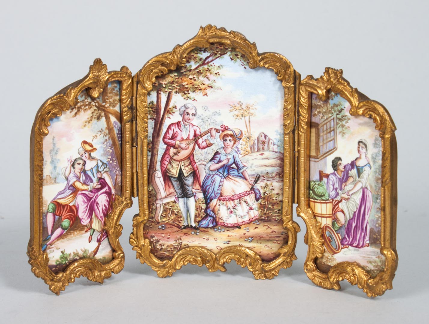 Appraisal: Continental gilt-metal and enamel triptych th century center and rings