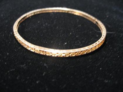 Appraisal: karat yellow gold open link bangle bracelet Highly repaired bracelet