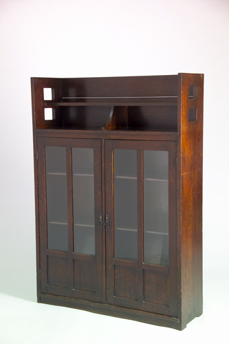 Appraisal: LIMBERT Two-door bookcase with bookshelf top and square cut-out sides