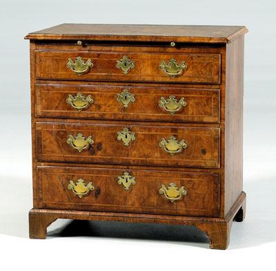 Appraisal: Fine Chippendale bachelor s chest bookmatched burlwood veneers pull-out slide