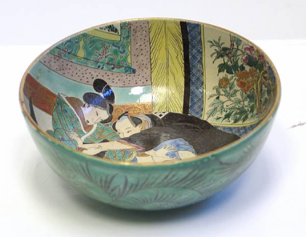 Appraisal: A Kutani glazed pottery erotic bowl With green ground exterior