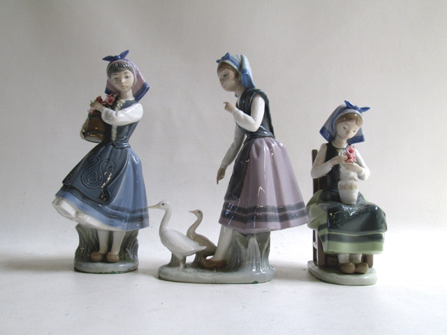 Appraisal: THREE LLADRO PORCELAIN FIGURINES by sculptor Francisco Catala Aracely with