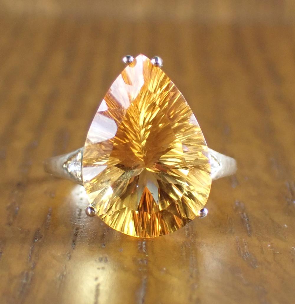 Appraisal: CITRINE DIAMOND AND FOURTEEN KARAT GOLD RING The k yellow