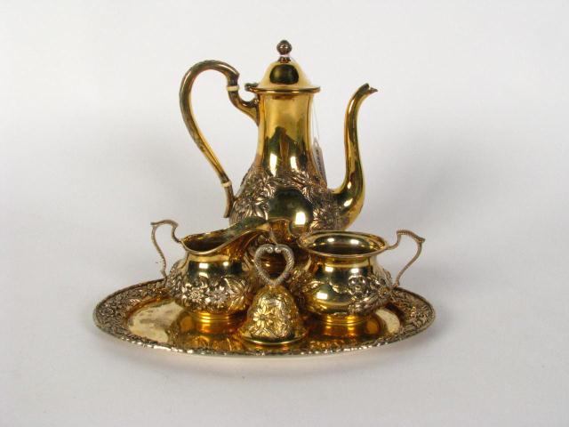 Appraisal: Kirk Repousse Sterling Vermeil Tea Set including '' teapot creamer