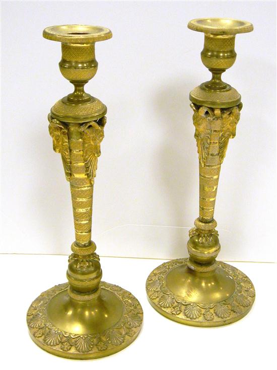 Appraisal: Pair brass candlesticks with goat heads and claw feet along