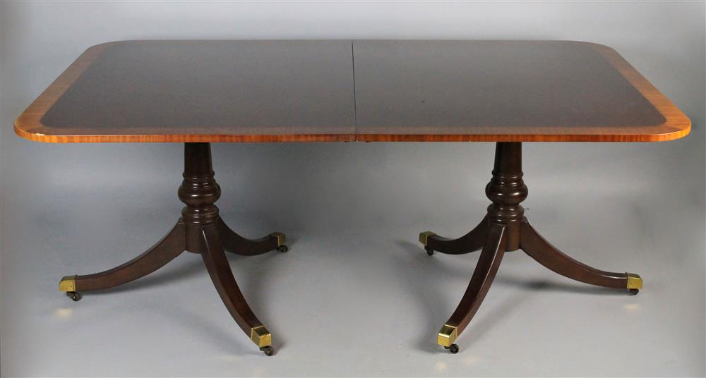 Appraisal: REGENCY STYLE BANDED MAHOGANY TWO PEDESTAL DINING TABLE rectangular table