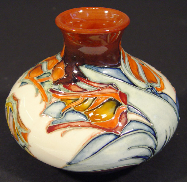 Appraisal: Moorcroft squat vase hand painted and tubelined with 'Red Tulips'