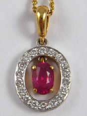 Appraisal: An carat gold ruby and diamond pendant the ruby of