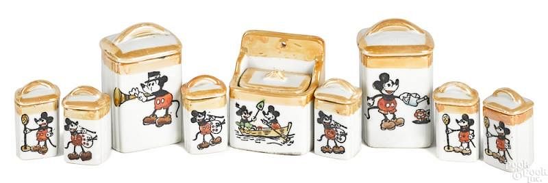 Appraisal: Scarce porcelain Mickey Mouse nine-piece canister Scarce porcelain Mickey Mouse