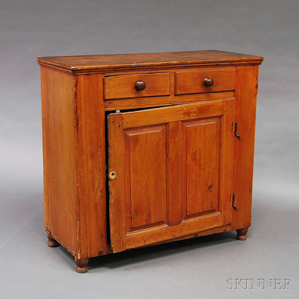 Appraisal: Pine Two-drawer Cupboard America th century the rectangular top over