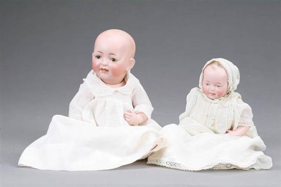 Appraisal: TWO BISQUE BABIES Bisque baby with molded hair glass eyes