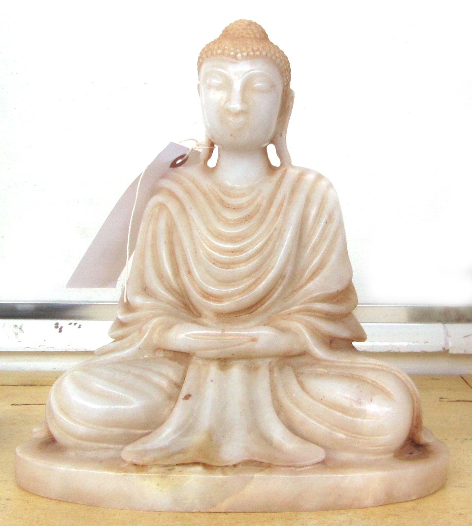 Appraisal: A modern South East Asian alabaster buddhistic figure modelled and