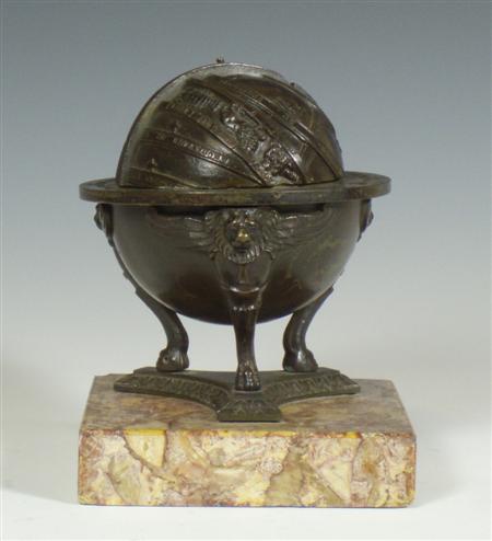 Appraisal: A th century Grand Tour bronze globe inkwell In the