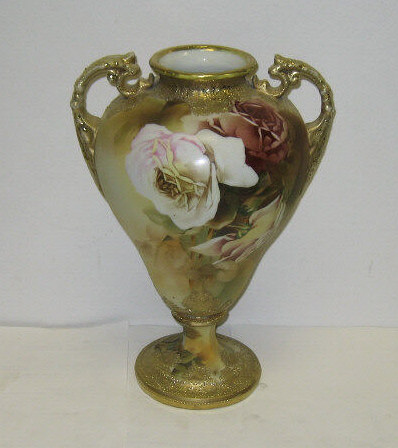 Appraisal: NIPPON PORCELAIN VASE Two-handled baluster form on pedestal base rose