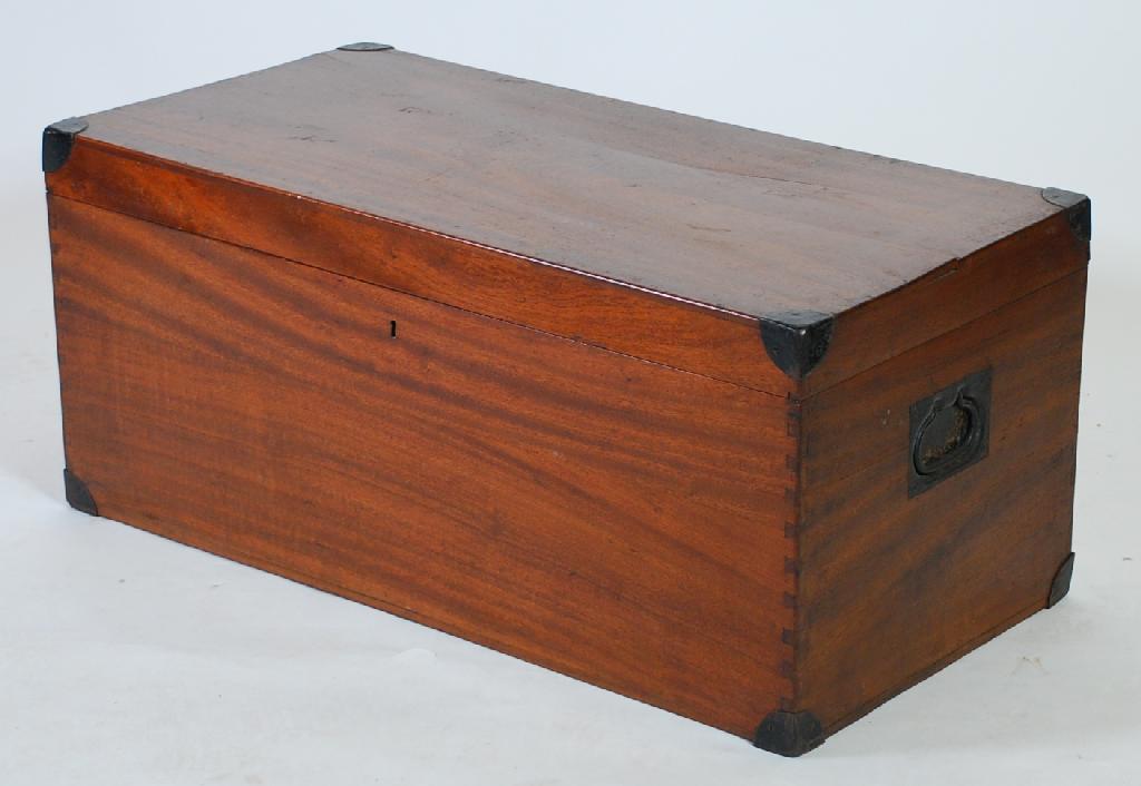 Appraisal: MAHOGANY TRUNK of typical form with black metal corners inset