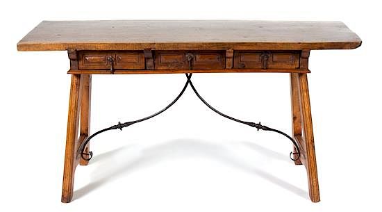 Appraisal: A Spanish Baroque Style Walnut Trestle Table A Spanish Baroque