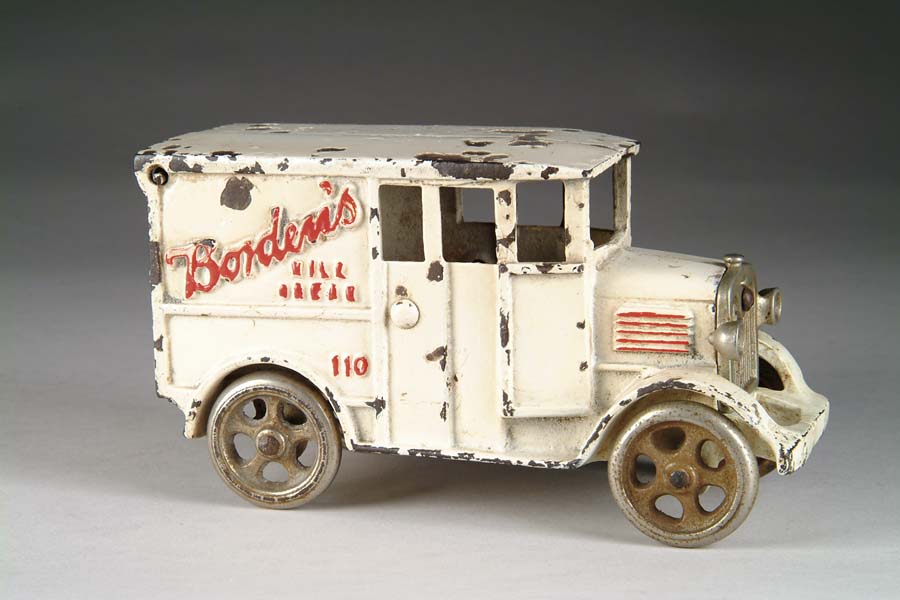 Appraisal: LARGE BORDENS MILK TRUCK A rare toy featuring opening rear