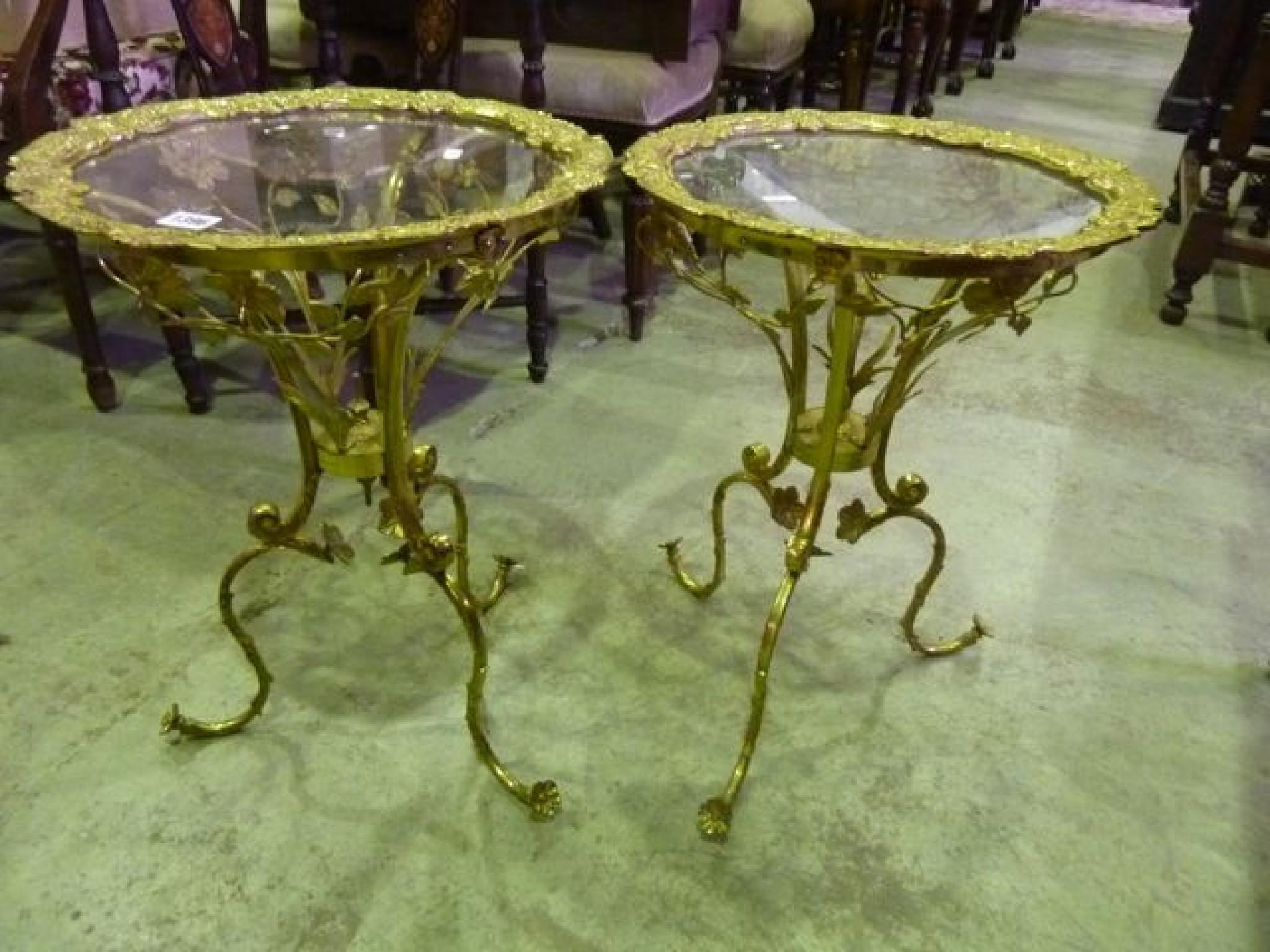 Appraisal: A pair of decorative cast gilt metal occasional tables with