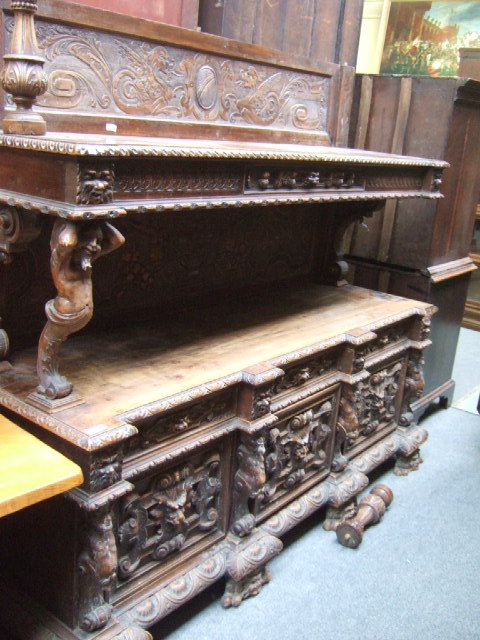 Appraisal: A large th century Flemish carved walnut side board in