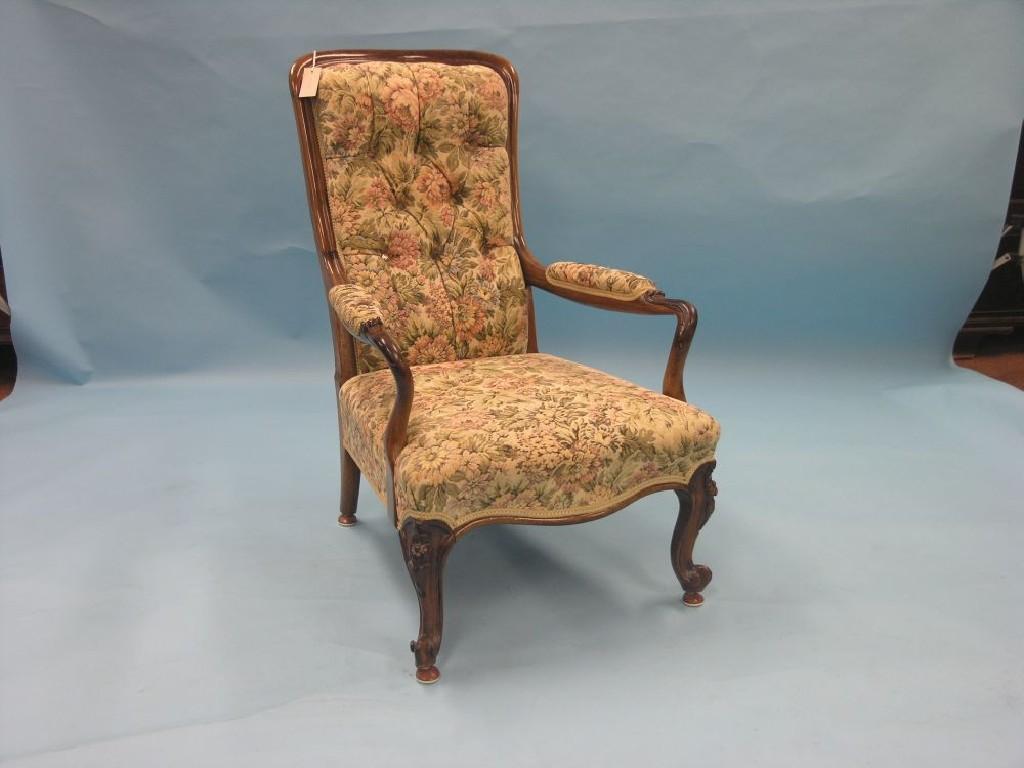 Appraisal: A Victorian rosewood open armchair on front cabriole legs with