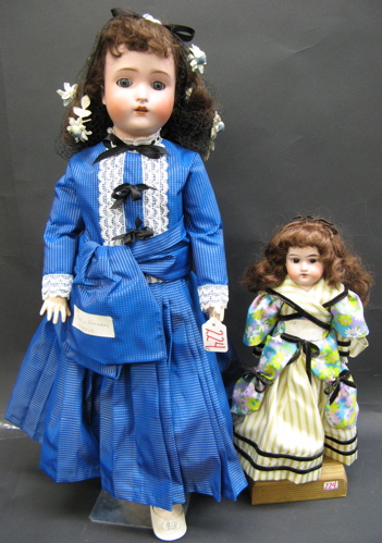 Appraisal: TWO GERMAN BISQUE HEAD DOLLS in and in One a