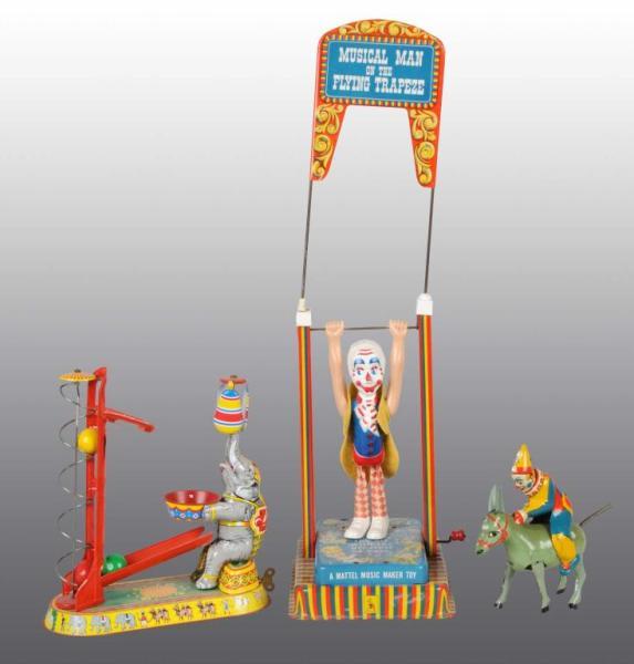 Appraisal: Lot of Tin Circus Related Toys Description Includes one German