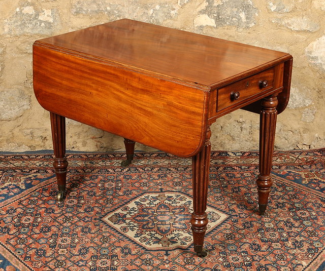 Appraisal: A GEORGE IV MAHOGANY RECTANGULAR PEMBROKE TABLE in the manner