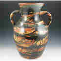 Appraisal: Massive Peters Reed Marbelized floor vase with loop handles in