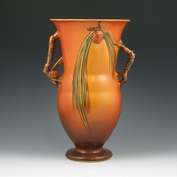 Appraisal: Roseville Pine Cone vase in brown with elaborate handles Marked