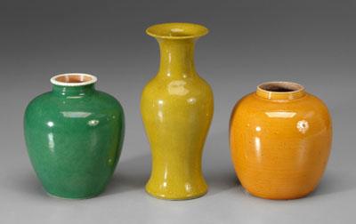 Appraisal: Three Chinese monochrome porcelains greenish-yellow glazed trumpet baluster vase in