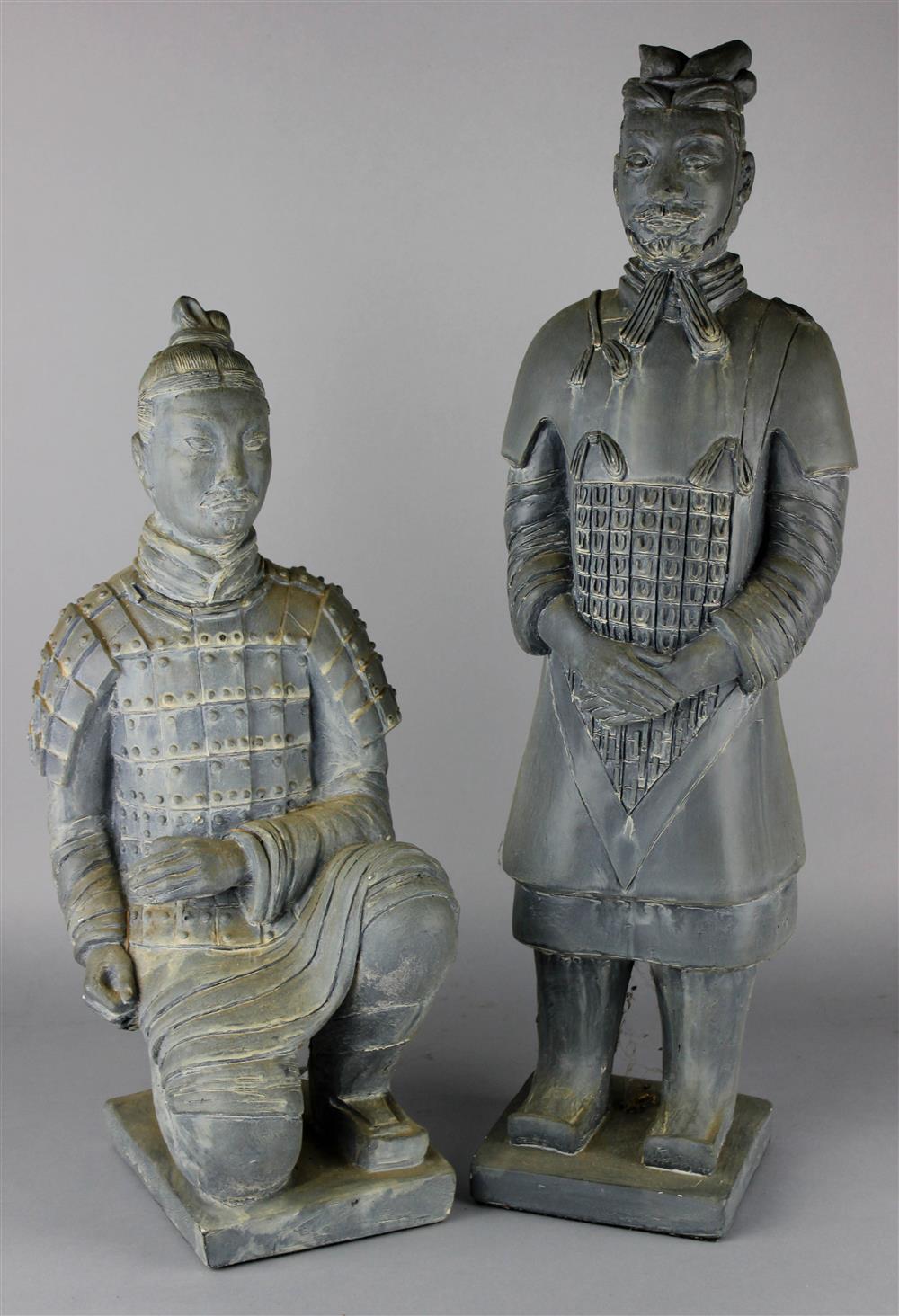 Appraisal: TWO GREY COMPOSITE FIGURES OF CHINESE WARRIORS a standing and