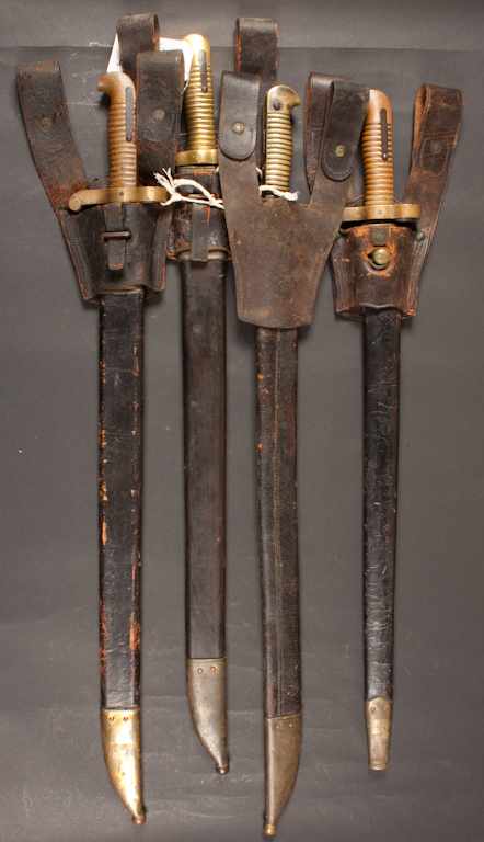 Appraisal: Four bayonets with scabbards one marked '' '' one marked