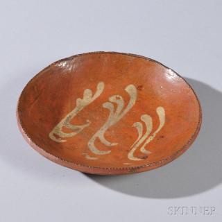 Appraisal: Slip-decorated Redware Plate America early th century round with coggled