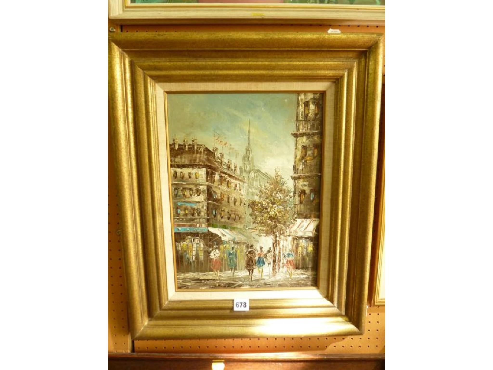 Appraisal: An oil painting on canvas of a Parisian street scene