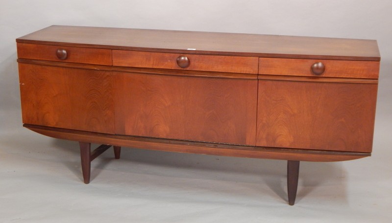 Appraisal: An Eon retro style teak bow fronted sideboard with three