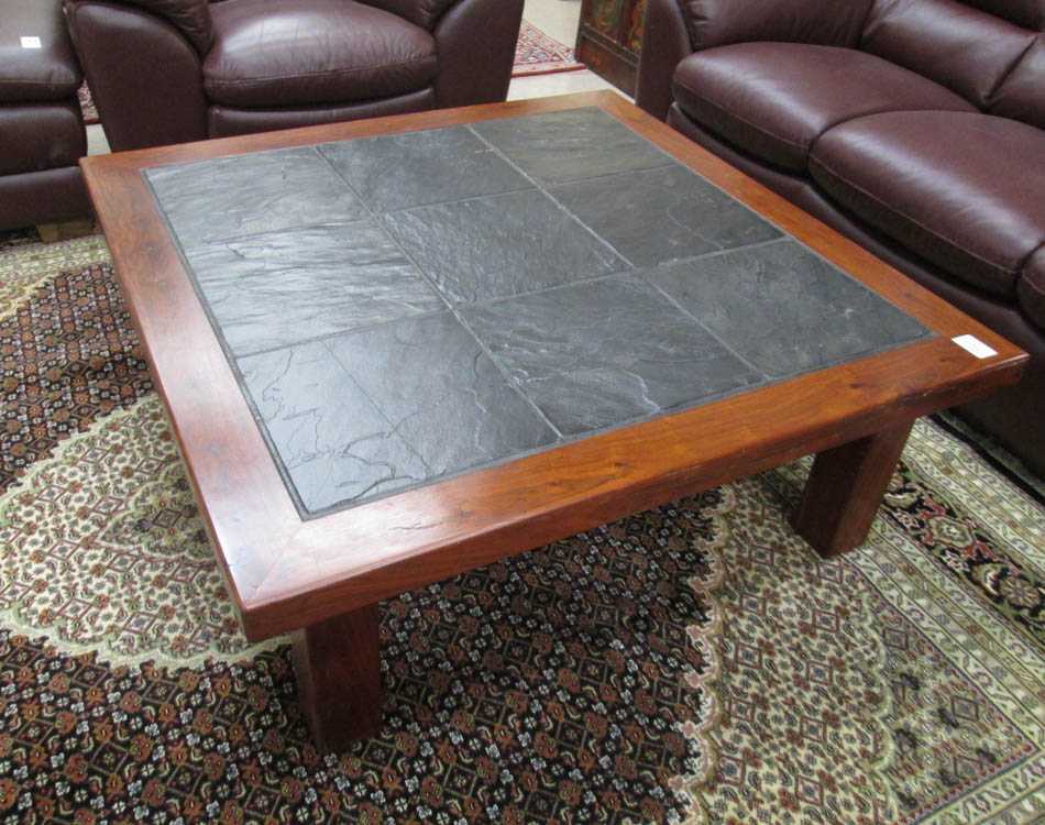 Appraisal: SQUARE JARRAH WOOD AND WESTERN BLUE SLATE COFFEE TABLE Hans