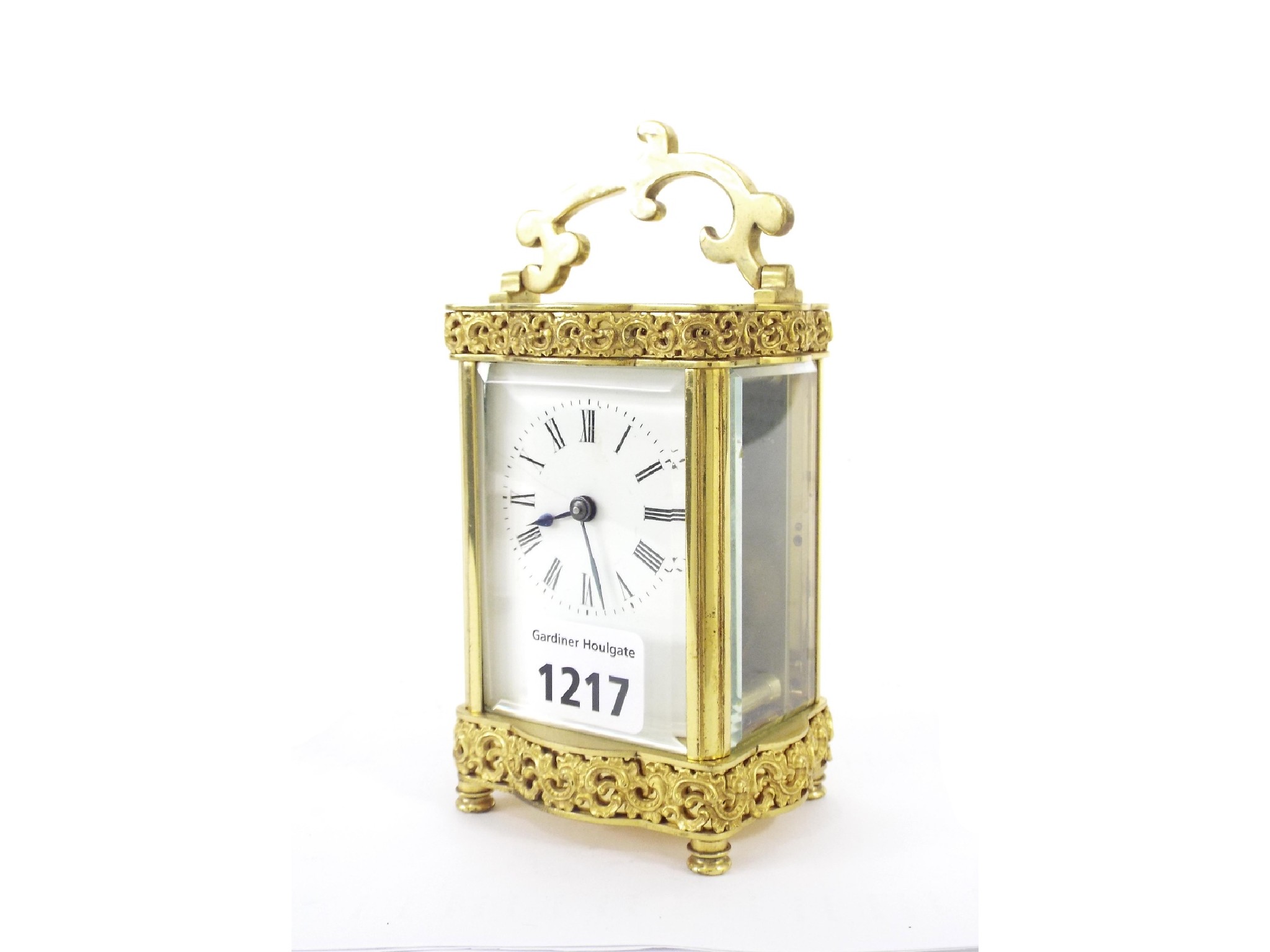 Appraisal: Carriage timepiece within an ornate bow fronted brass case high