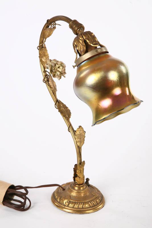 Appraisal: SINGLE SHADE LAMP Brass table lamp with Art Nouveau style