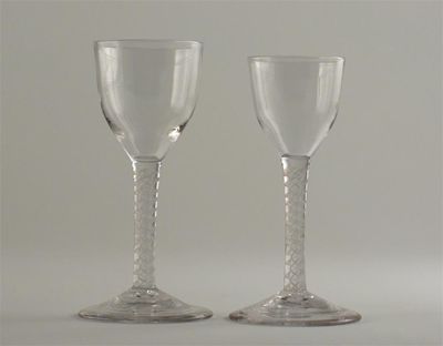 Appraisal: Two wine glasses with plain bowls and double series opaque