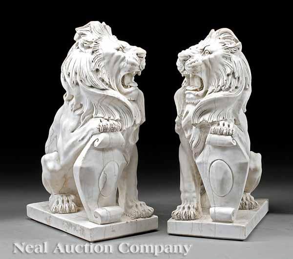 Appraisal: A Pair of Italian Carrara Marble Guardian Lions the opposing