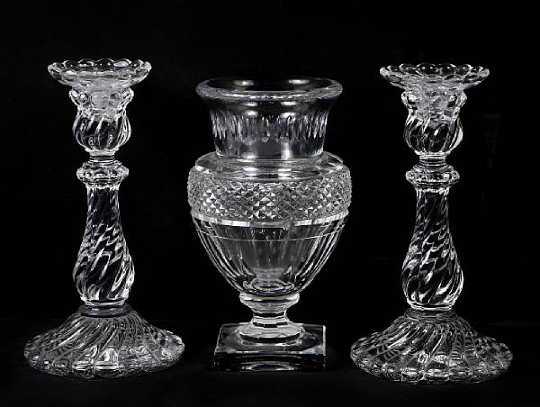 Appraisal: A pair of Baccarat spiral molded glass candlesticks together with