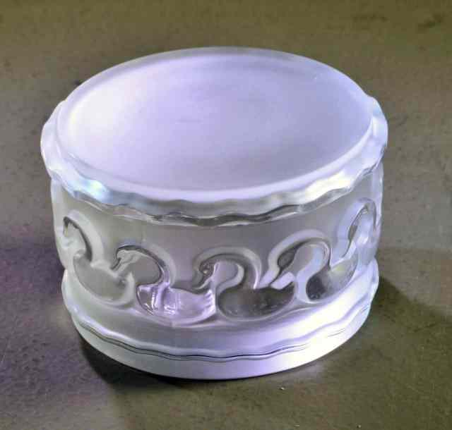 Appraisal: LALIQUE DRESSER JAR WITH DUCKS CIRCLINGLovely covered frosted glass dresser