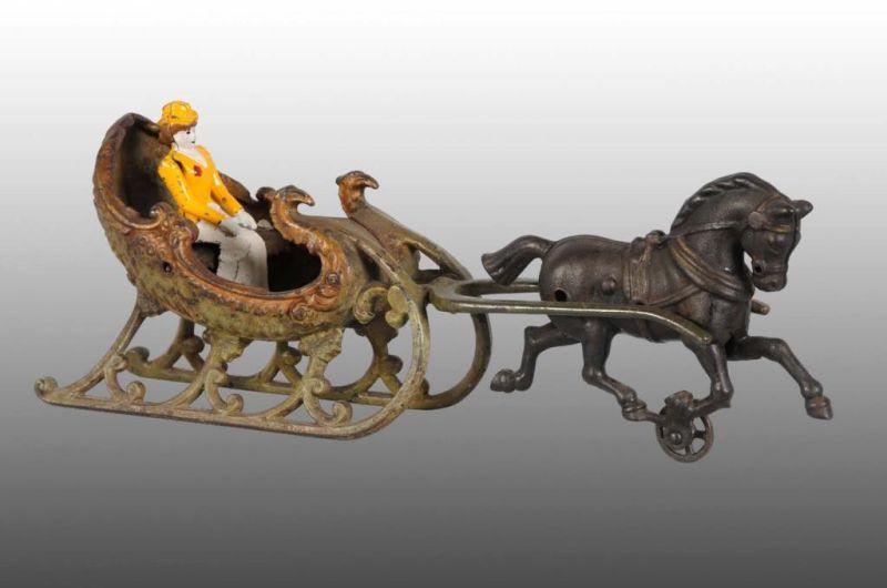 Appraisal: Cast Iron -Horse Sleigh Toy Description Replaced figure Size L