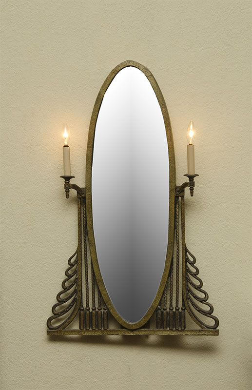 Appraisal: AFTER OSCAR BACH LIGHTED DECO WALL MIRROR Cast brass deco