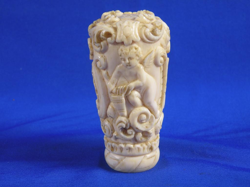 Appraisal: A late thC Dieppe ivory walking stick handle carved with