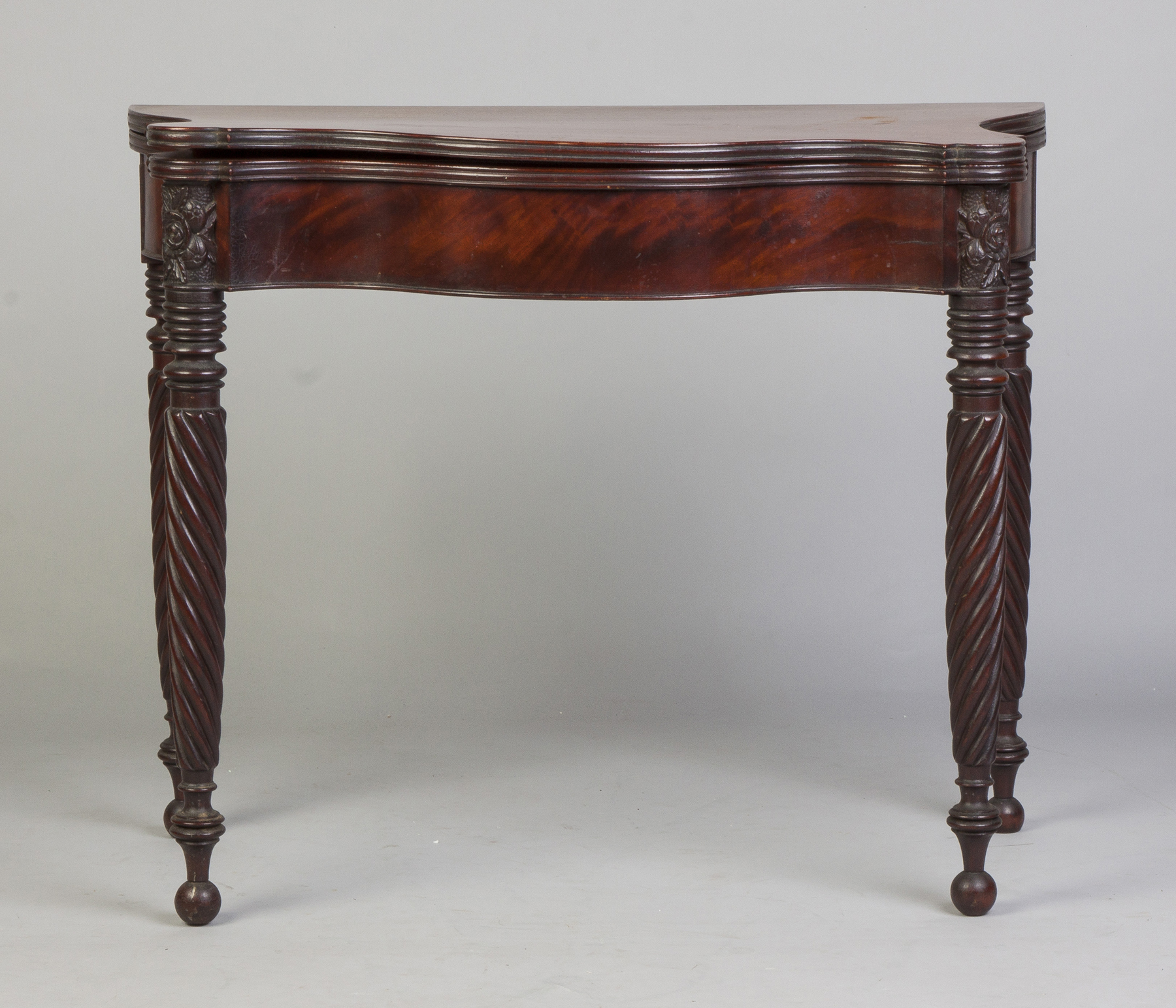 Appraisal: MA Sheraton Serpentine Card Table Early th cent Figured mahogany